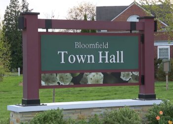 Bloomfield rolls back cuts to trash pickup, pool and senior service