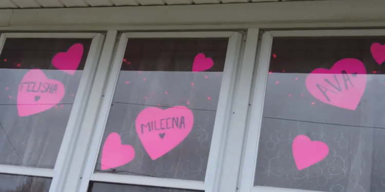 Plainville neighborhood turns on pink lights in honor of mother, daughters killed by boyfriend