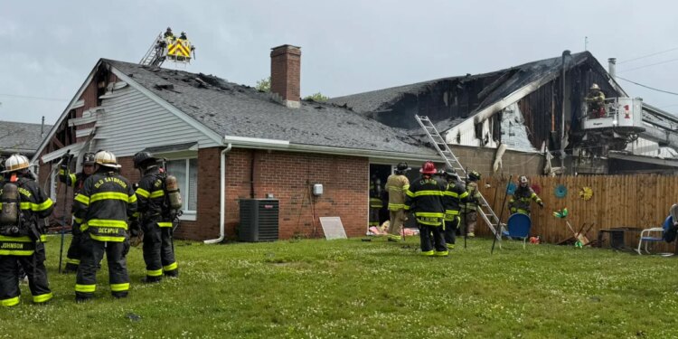 Fire extends from attic of well-known Clinton donut shop