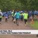 Connecticut students crossing finish line of youth running program