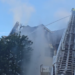 Firefighters fighting apartment fire in Groton Sunday morning