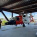 Historic helicopter hoisted into National Coast Guard Museum under construction in New London