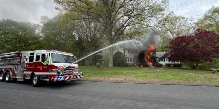 PHOTOS: Crews spend more than 5 hours fighting Middlebury house fire