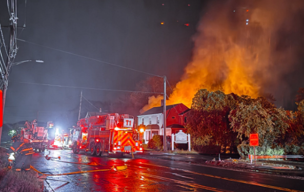 PHOTOS: Overnight fire damages Branford building after vehicle drags downed wires on East Main Street