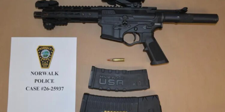 Police: Man sleeping in apartment stairway found with assault weapon in Norwalk