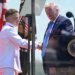 Who were the cadets Trump invited on stage during the 2026 Coast Guard Academy graduation?