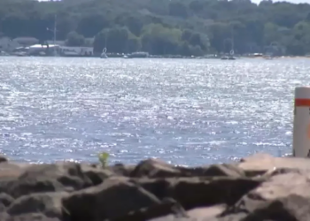 2 men rescued from water hours after boat capsized off West Haven