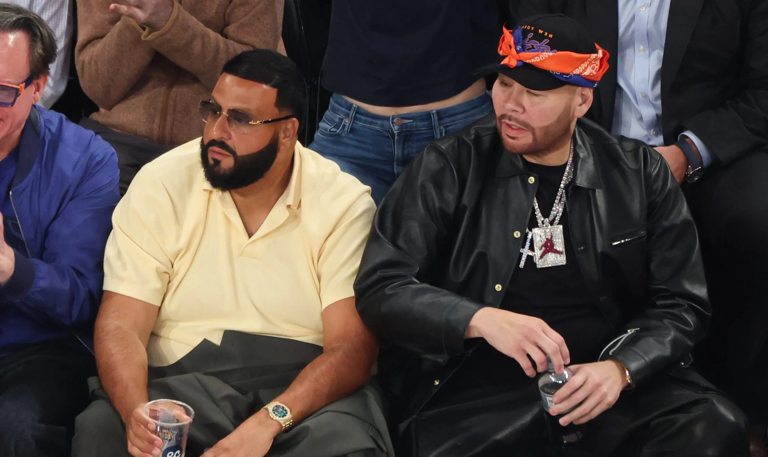 DJ Khaled and Fat Joe attend a game.
