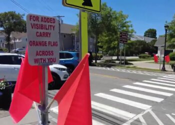 East Lyme installs orange flags at Niantic crosswalks to help pedestrians safely cross