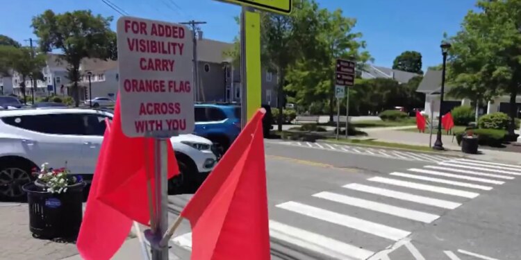 East Lyme installs orange flags at Niantic crosswalks to help pedestrians safely cross