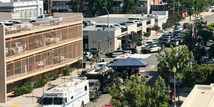 Police say man barricaded himself inside Chase bank building with others in California