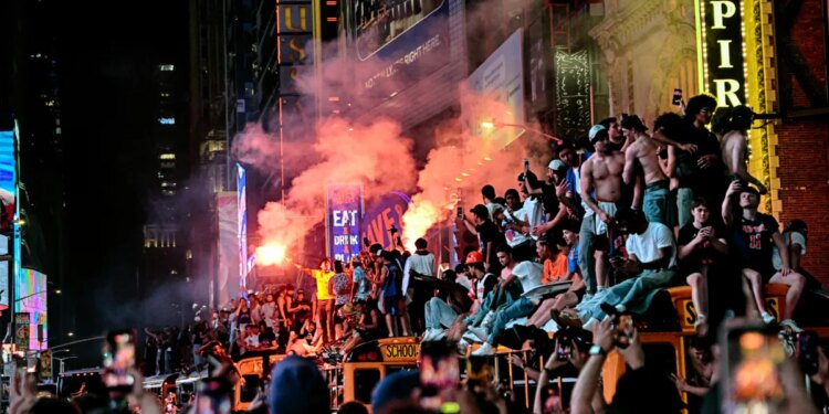 Mayhem mars euphoria as New York City celebrates the Knicks' first championship in 53 years