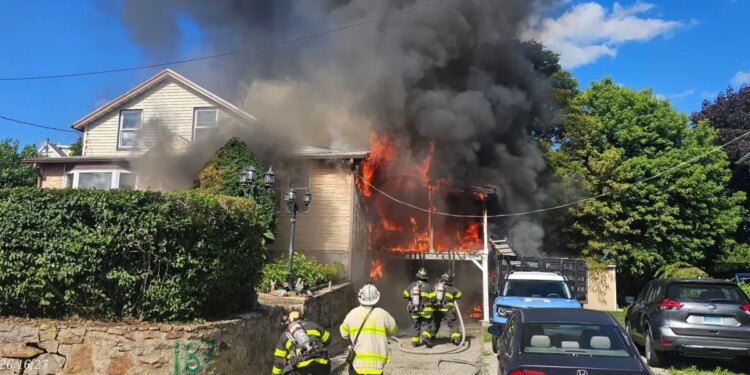 Teen jumps out of Norwalk multi-family home during fire, 1 firefighter injured