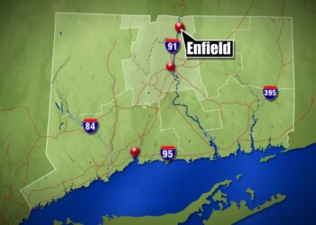 Enfield crash closes road after taking down pole and wires