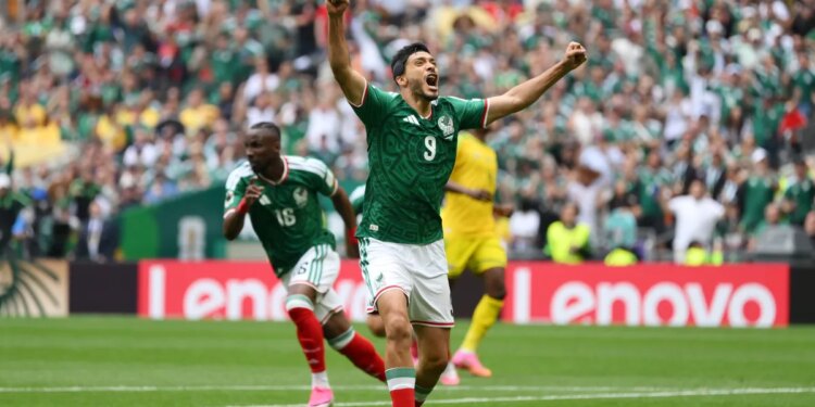 Mexico tops South Africa 2-0 in World Cup opener with three red cards