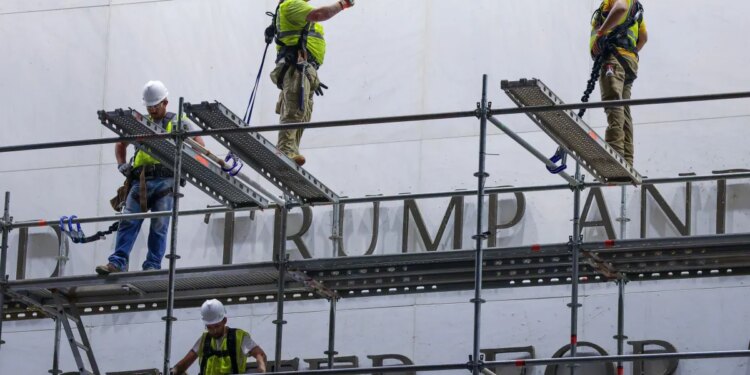 Workers begin removing Trump's name from the Kennedy Center, hours after a court-ordered deadline