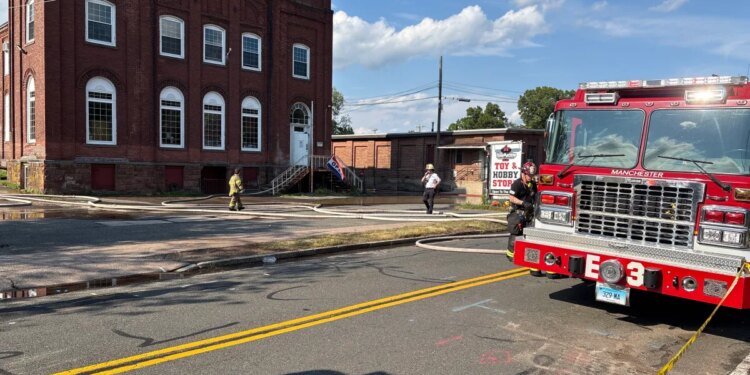 Multiple crews battle 3-alarm fire at Manchester mill building