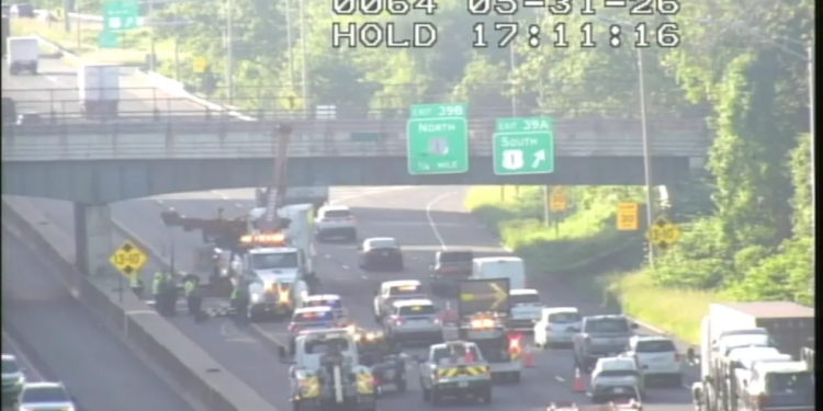 Overturned vehicle causing congestion on I-95 North in Milford