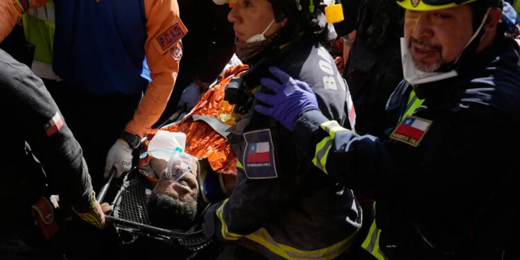 Venezuelan security guard pulled alive from building basement 8 days after twin quakes