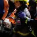 Venezuelan security guard pulled alive from building basement 8 days after twin quakes