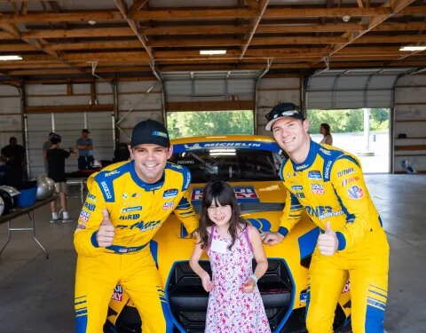 Connecticut kids living with serious illness or disability get to ride in race cars during a Team IMPACT day at Thompson Speedway