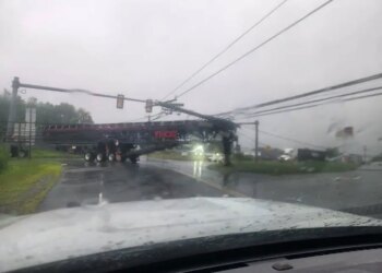 Crash involving crane, power lines closes intersection in Colchester