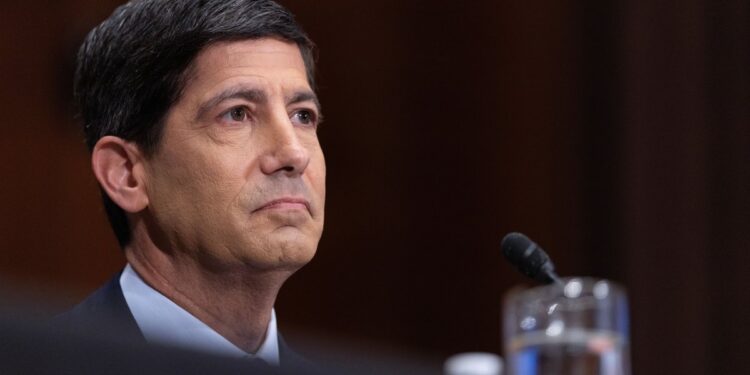 Federal Reserve holds rates unchanged, but three members voted to hike amid high prices