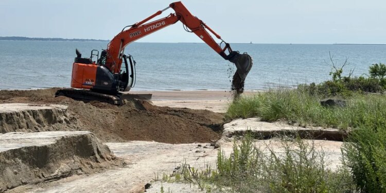 Heavy rain carves deep canyons into West Haven beach