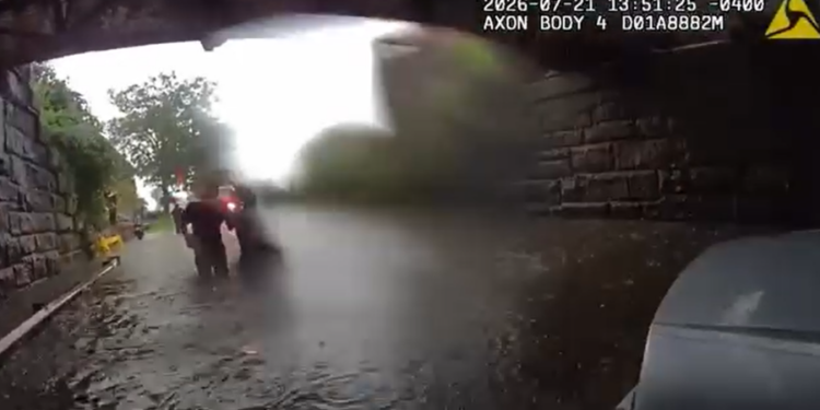 Milford police rescue 2 from car filling up with water during flash flooding: VIDEO