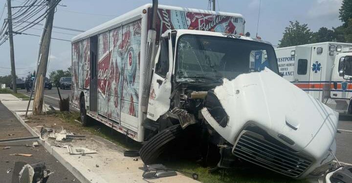 PHOTOS: 2 people injured in Westport box truck crash on Post Road East