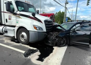 PHOTOS: Crash, 'significant' fluid spill closes Route 5 in South Windsor