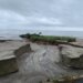 VIDEO: West Haven beach swept away by floodwater