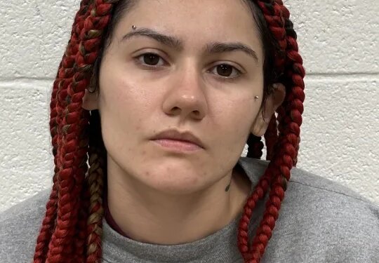 Woman charged with murder of man found dead behind Farmington condo complex