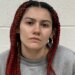 Woman charged with murder of man found dead behind Farmington condo complex
