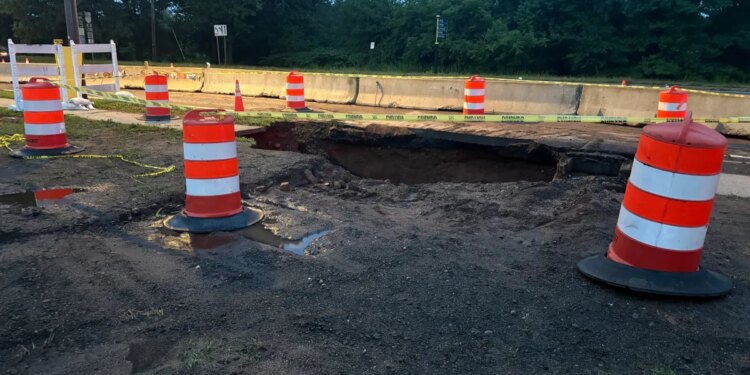 Crews work to repair large sinkhole on Route 10 in New Haven